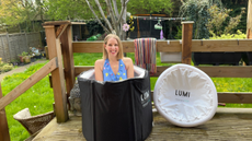 Fitness writer Maddy Biddulph in the LUMI recovery pod inflatable ice bath