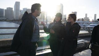 Hugh Jackman and Rebecca Ferguson talking to Reminiscence director Lisa Joy on location in New Orleans