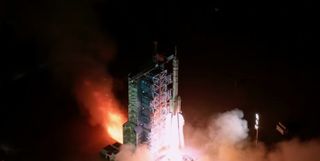 Screenshots showing a rocket blasting off from a launch pad