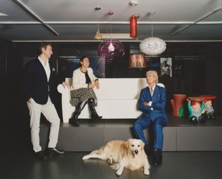 Federico, Lorenza and Claudio Luti (with golden retriever Jack) photographed at the Kartell Museum in Noviglio with the brand’s ‘Bubble Club’ sofa and ‘Saint Esprit’ and ‘Attila’ side tables, all designed by Philippe Starck, and ‘È’, ‘Fl/y’, ‘Easy’, ‘Gè’ and ‘Bloom’ pendants, all designed by Ferruccio Laviani