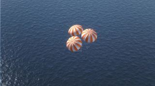 Three main parachutes will slow NASA's Orion spacecraft for the final splashdown at the end of the Exploration Flight Test 1, an unmanned demonstration flight to test critical in-flight and re-entry systems.