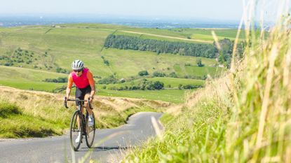 Female cyclist on her longest bike ride of the year