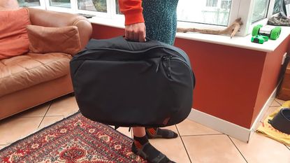 Peak Design Travel backpack held like a suitcase