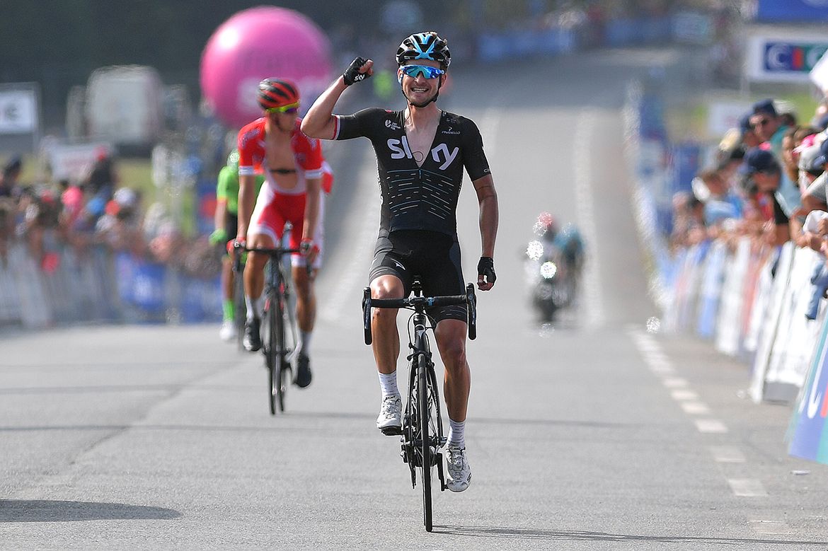 Michal Golas celebrates the victory of teammate Elia Viviani at the Bretagne Classic