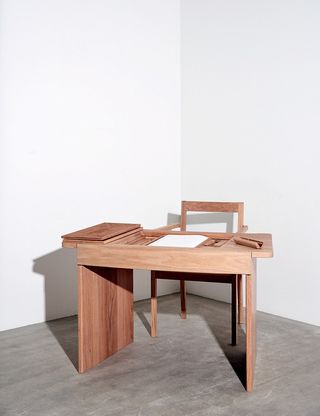 Wooden writing desk and chair