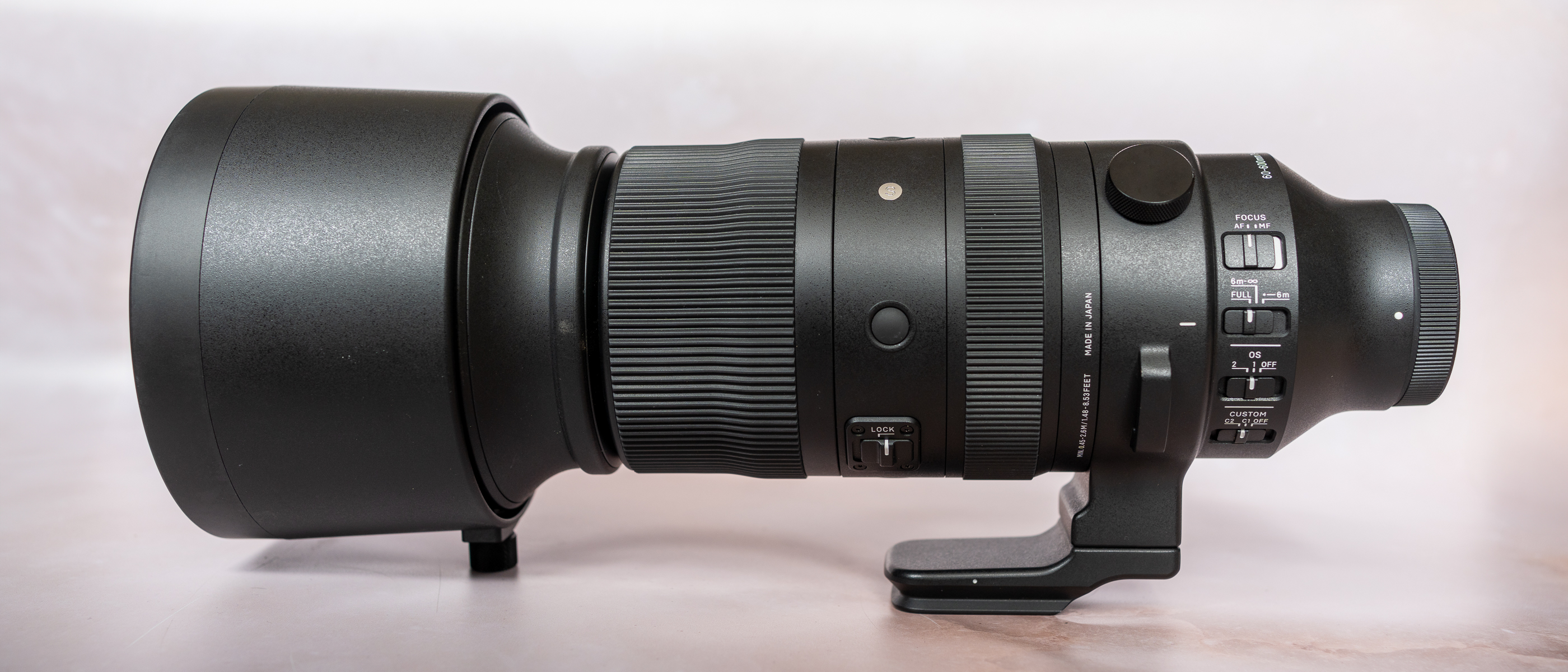 Sigma 60-600mm f/4.5-6.3 DG DN OS Sports lens on a neutral background