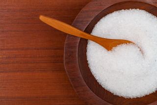 Epsom salt in a bowl with spoon