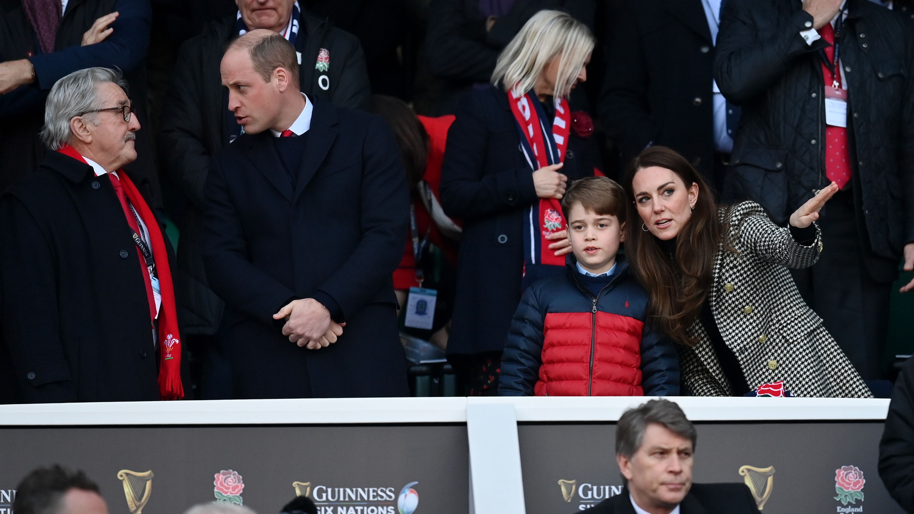 Catherine, Princess of Wales speaks to Prince George prior to the Guinness Six Nations Rugby match between England and Wales in 2022