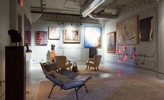The installation features treasures such as a 2013 Douglas Gordon light bulb sculpture and nude painting
