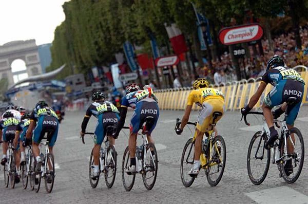 Contador in the best seat in the house behind big George Hincapie