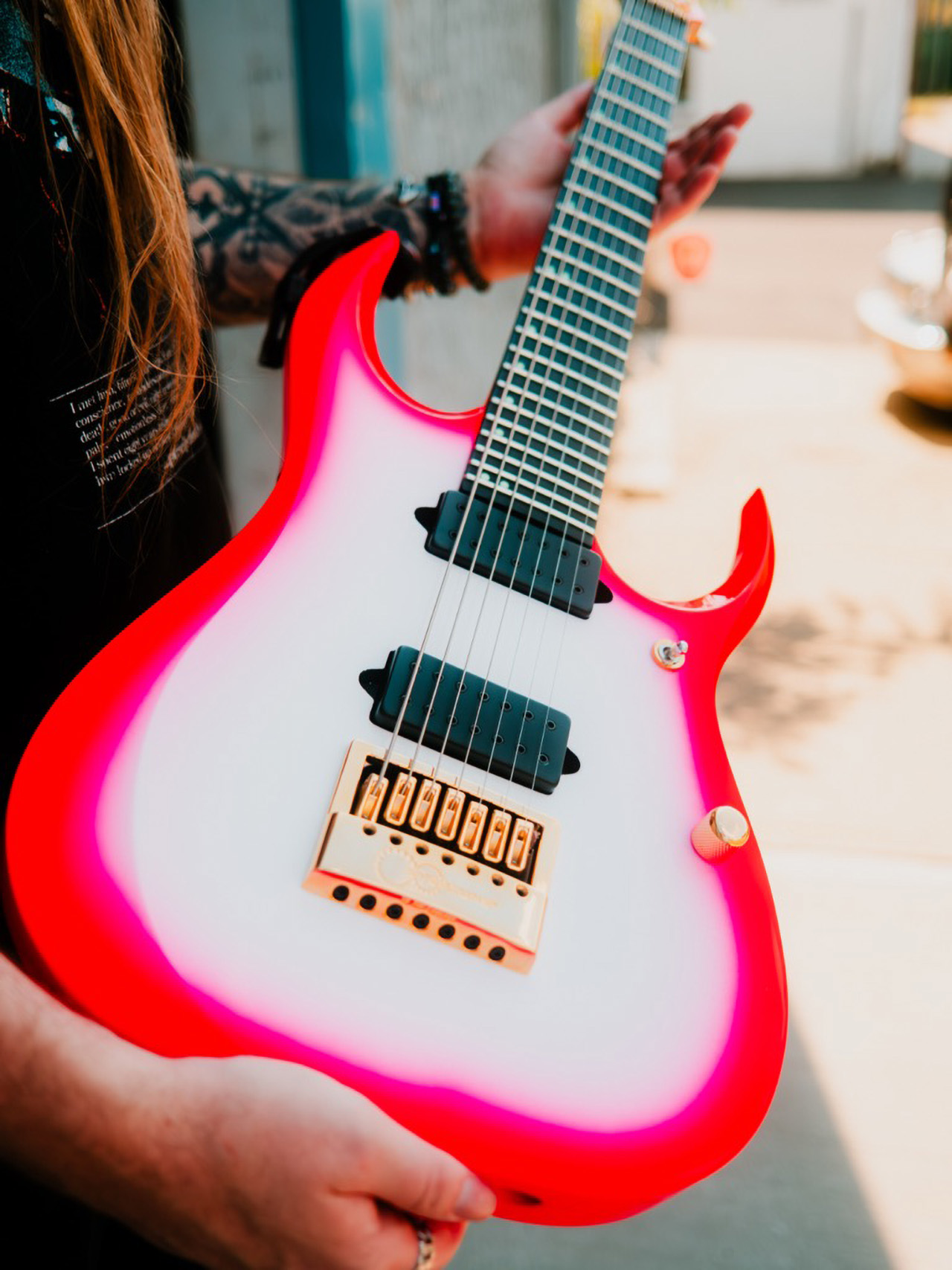 Lorna Shore&amp;rsquo;s Andrew O&amp;rsquo;Connor holds his custom Ibanez guitar