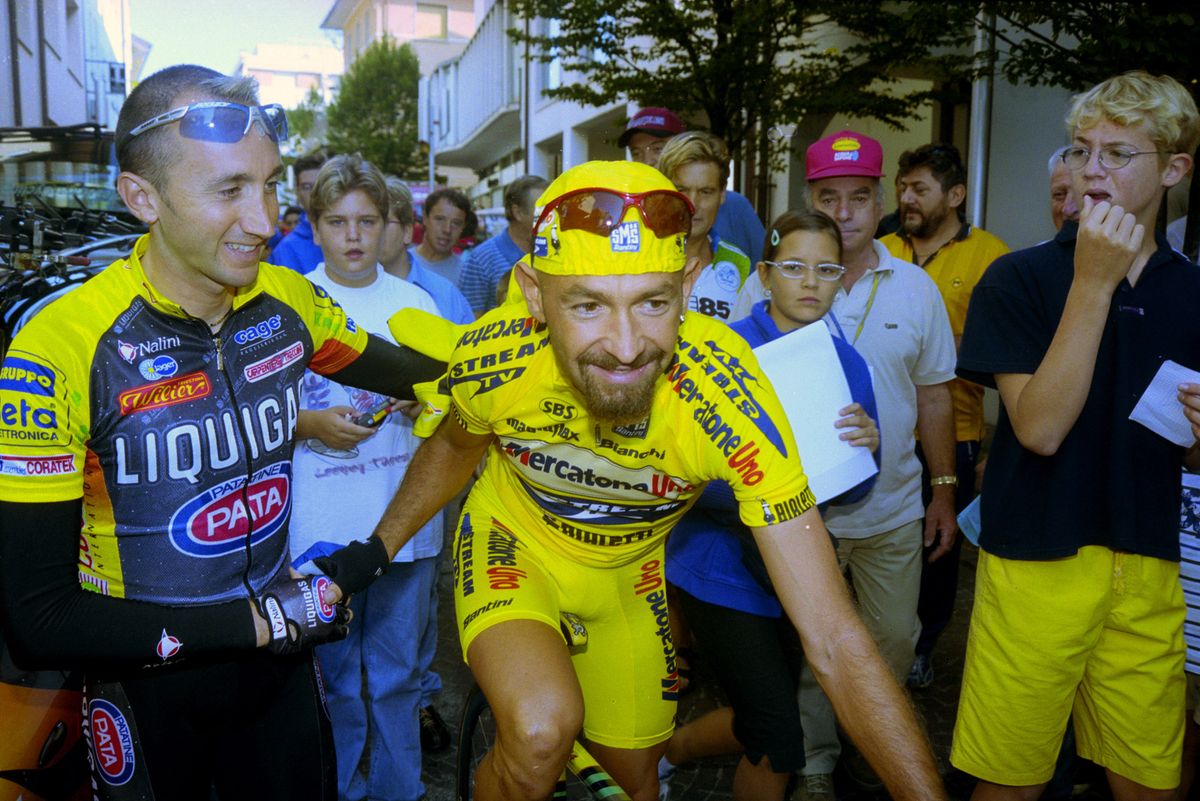 Rebellin was controversially omitted from the Sydney Olympics in favour of Marco Pantani. The two are pictured together at the following season's Giro del Friuli.