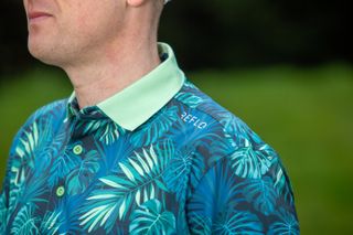 A detailed look at the collar of the Reflo Congo polo shirt