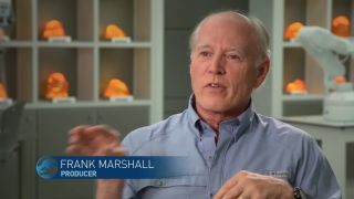 Frank Marshall in conversation, as he sits in the genetics lab of Jurassic World.