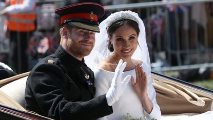 Meghan Markle’s wedding speech explained. Seen here she and Prince Harry wave on their wedding day