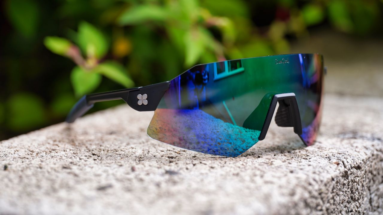 SunGod Ultras running sunglasses on a stone block 