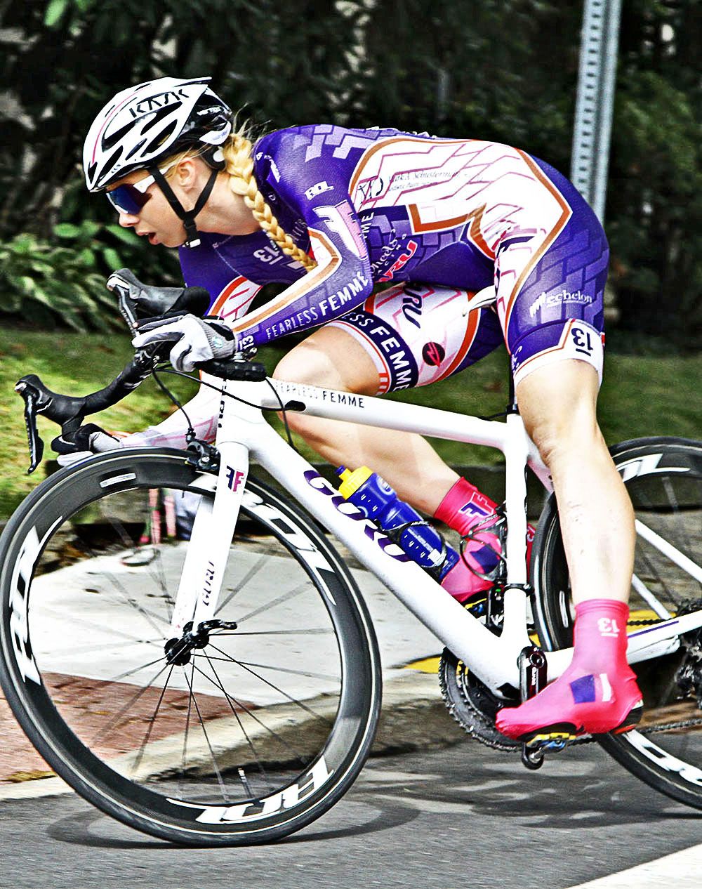 Amy Cutler (Fearless Femme p/b Haute Wheels Racing) starts blocking for her team.