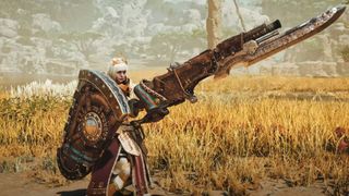 A character with white hair holding the Gunlance weapon in Monster Hunter Wilds.