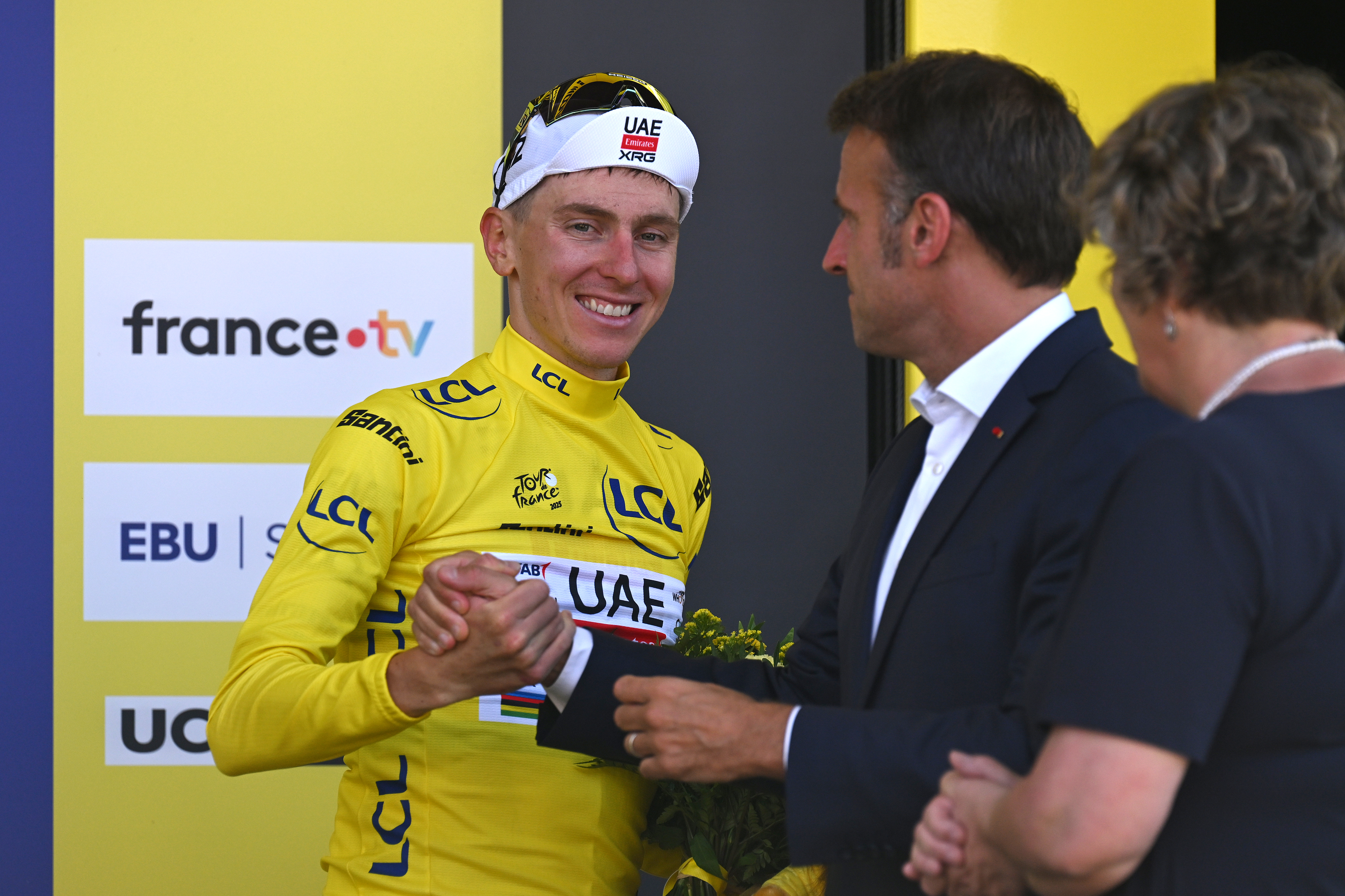 HAUTACAM, FRANCE - JULY 17: (L-R) Tadej Pogacar of Slovenia and UAE Team Emirates - XRG - Yellow leader jersey and the France's President, Emmanuel Macron during the 112th Tour de France 2025, Stage 12 a 180.6km stage from Auch to Hautacam 1519m / #UCIWT / on July 17, 2025 in Hautacam, France.