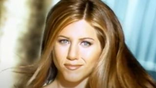 Jennifer Aniston looking fabulous and directly at the camera in a L'Oreal commercial.