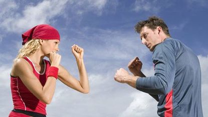 man and woman sparring