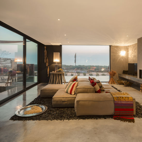 living room with grey flooring with sofa set