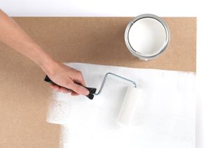 Painting a piece of MDF with a paint roller
