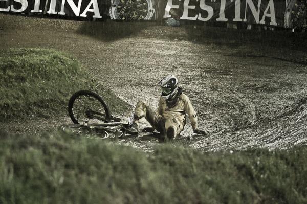 A riders down in slippery, wet conditions
