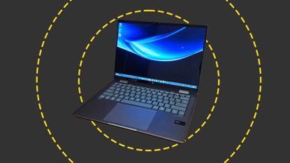 The HP Envy x360 on the ITPro background