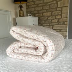 The Silentnight Restore Cooling Copper Topper being tested at home on a bed
