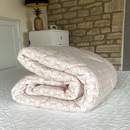 The Silentnight Restore Cooling Copper Topper being tested at home on a bed