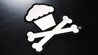 Johnny Cupcakes; brand logo in black and white