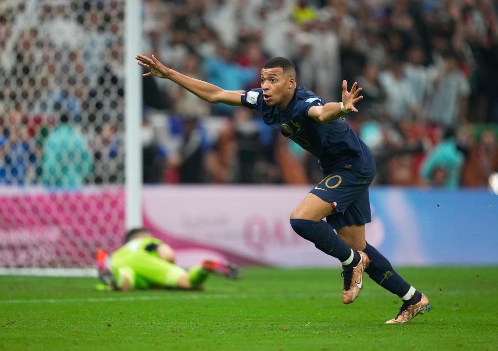 Kylian Mbappe celebrates scoring one of his three goals in the 2022 World Cup final