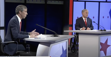 Beto O'Rourke and Gov. Greg Abbott face each other during a debate. 