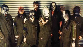 Slipknot posing for a photograph in 2002