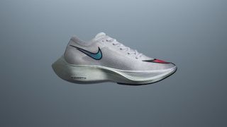 Nike ZoomX Vaporfly NEXT% against grey background