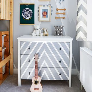 boys bedroom with grey chest of drawers