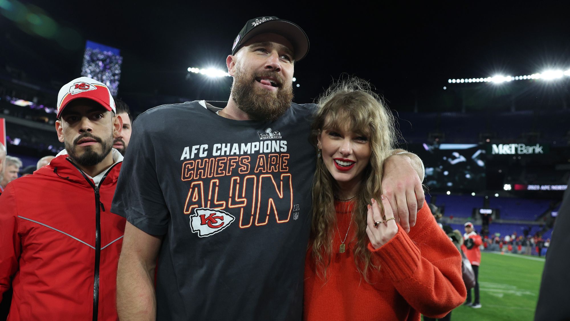 Travis Kelce and Taylor Swift attend the AFC Championship