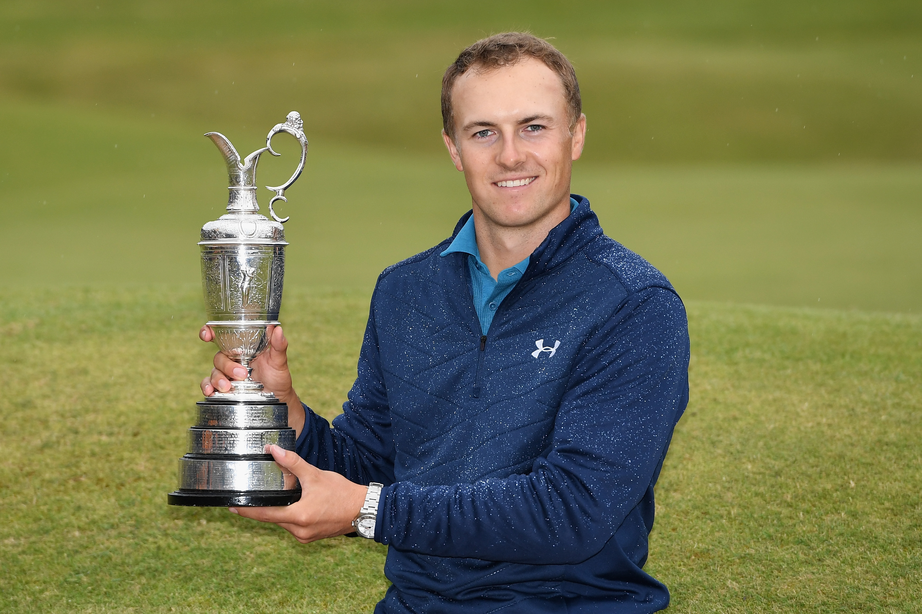 Jordan Spieth holding Claret Jug after winning 2017 Open