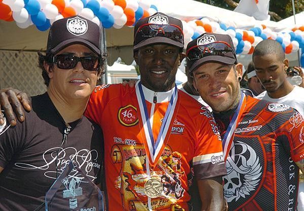 Rock Racing owner Michael Ball hangs out with riders