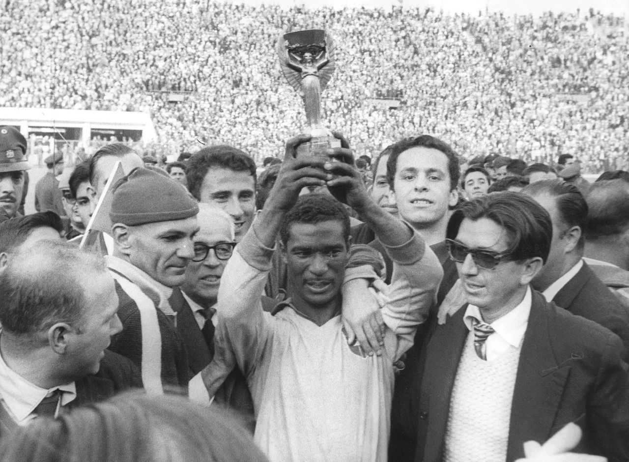 Didi holds the Jules Rimet trophy aloft after Brazil's victory over Czehoslovakia in the 1962 World Cup final