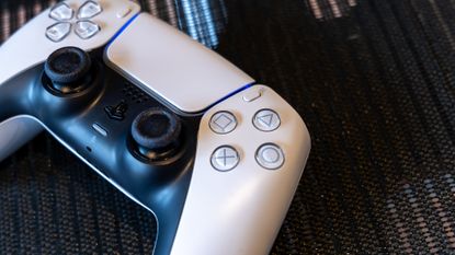 DualSense controller on black background