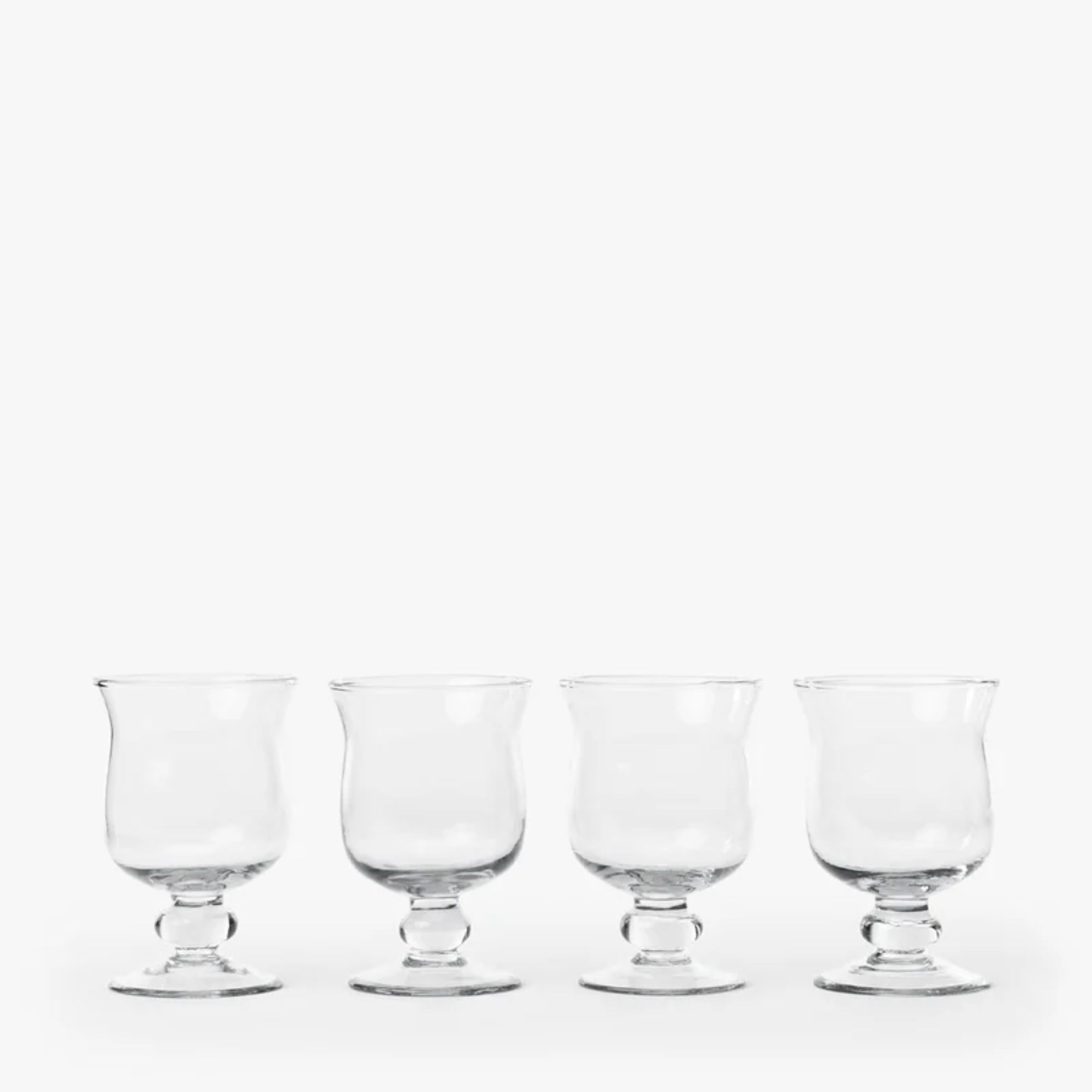 Set of four glass wine goblets