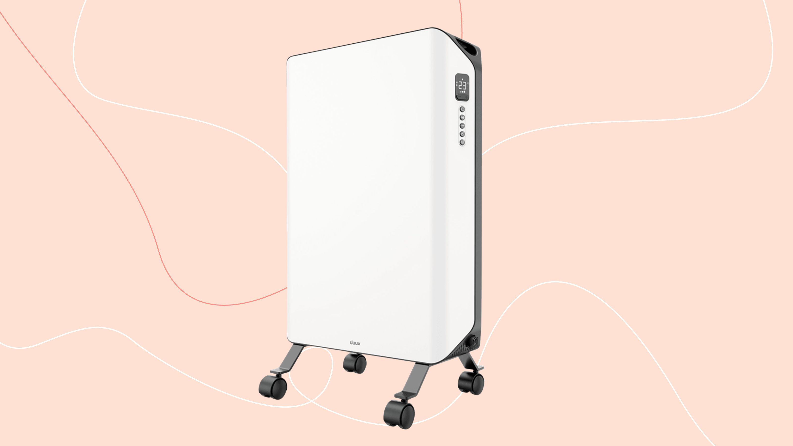 Duux Edge 2000W Oil-Filled Radiator on a pink background