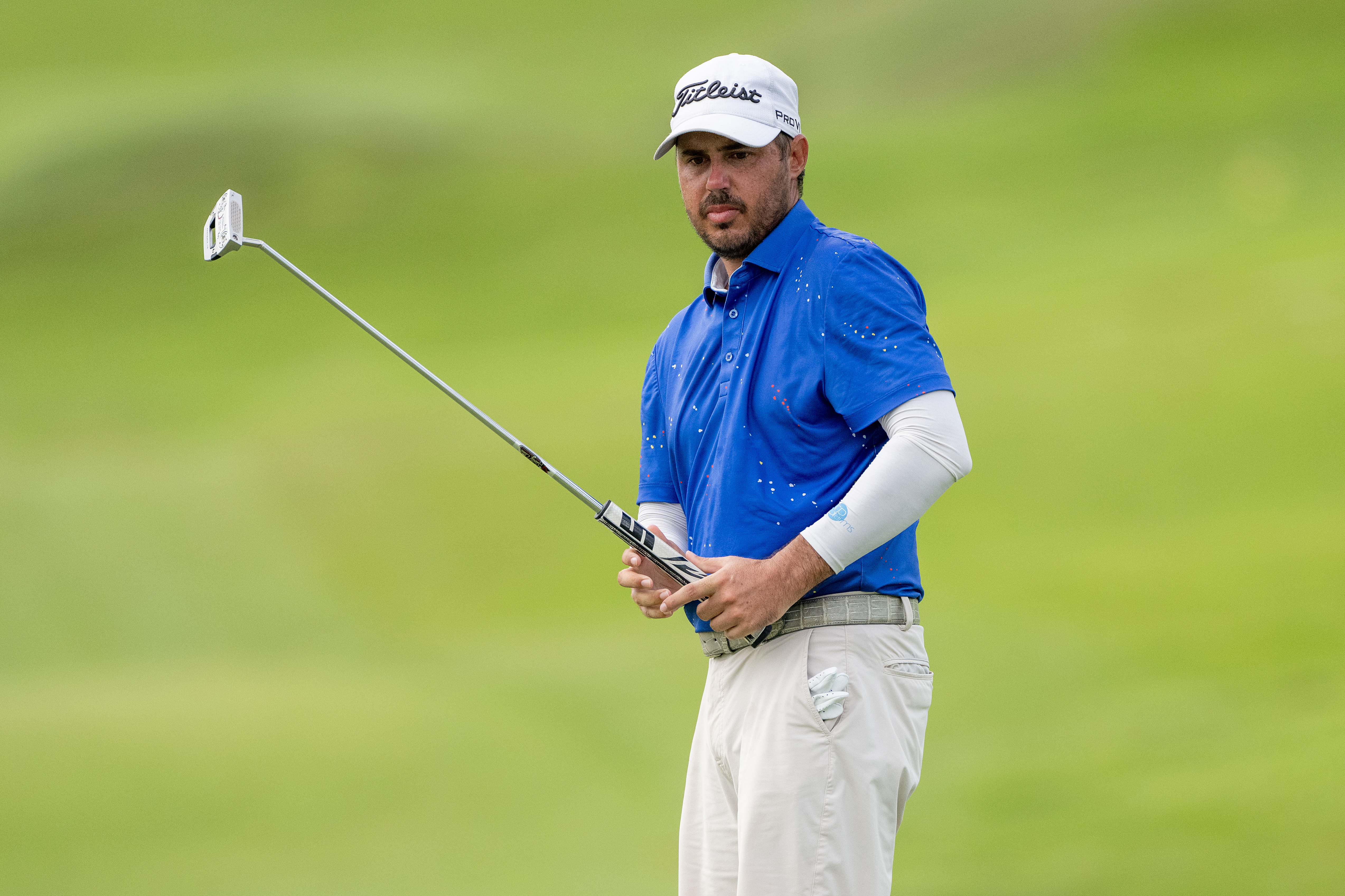 Chase Koepka watches a putt