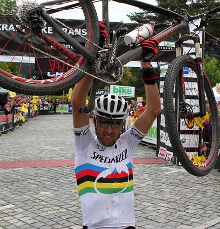 Christoph Sauser (Specialized) celebrates winning stage 1