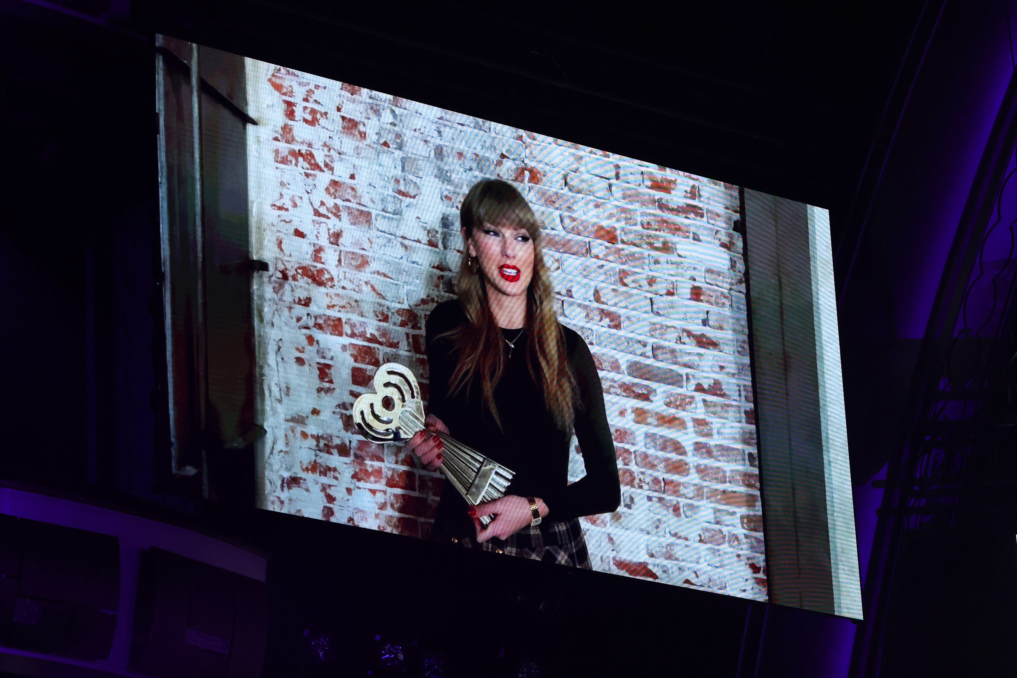 Taylor Swift skipping the iHeartRadio Music Awards red carpet for a virtual video
