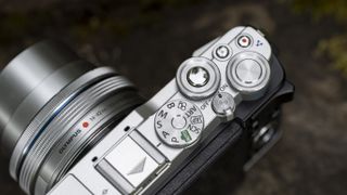 The top plate and dials of the Olympus E-P7