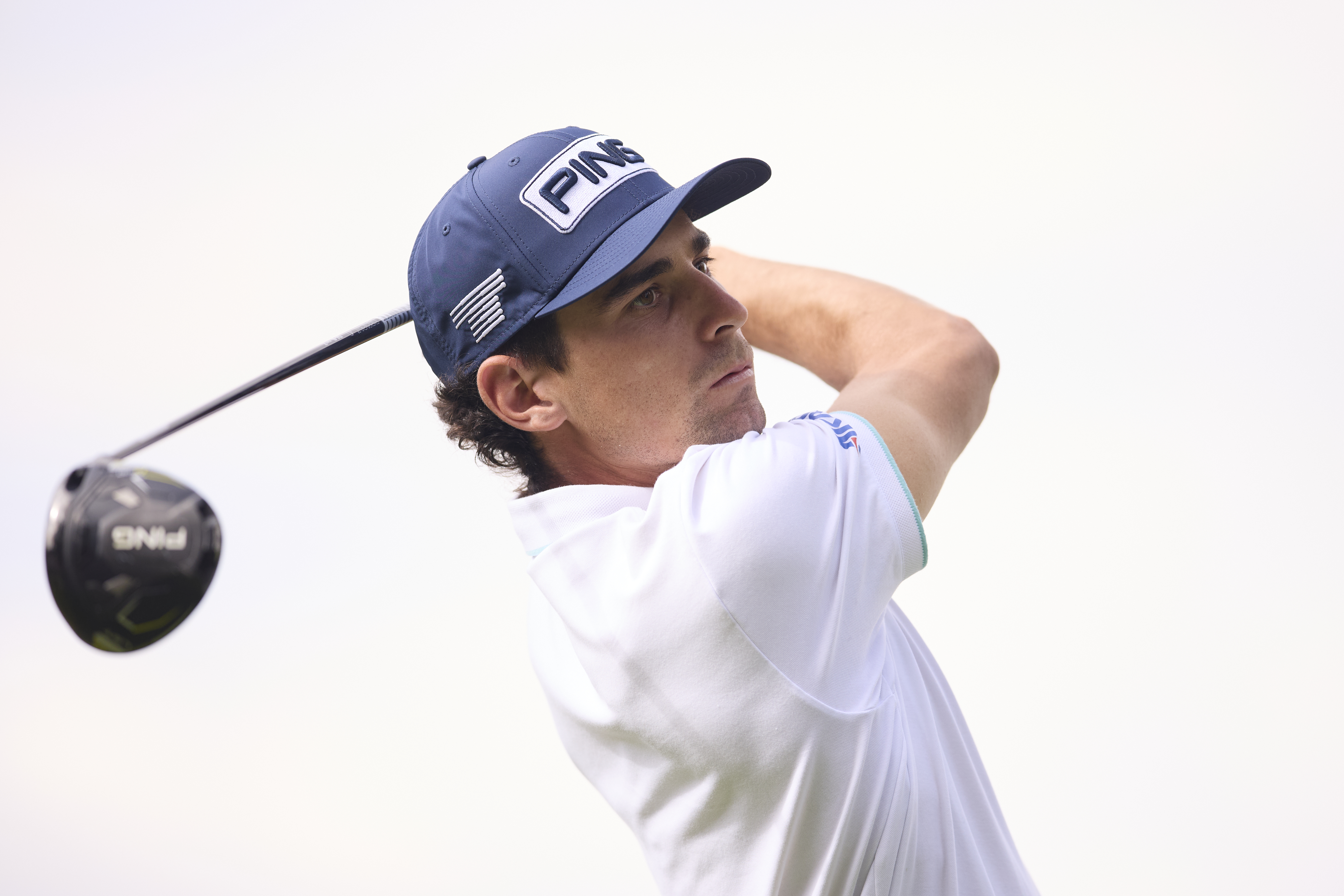 Joaquin Niemann hits a driver off the tee