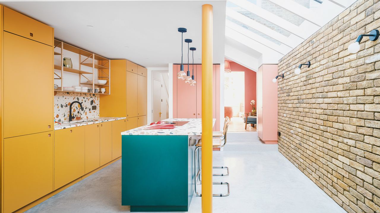 colourful kitchen with terrazzo island countertop and splashback